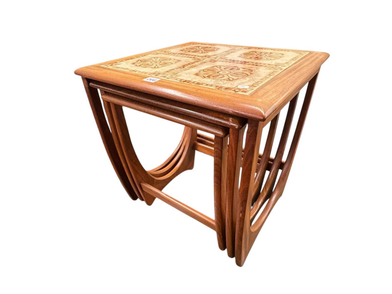 G Plan teak nest of three table, the largest tile topped, 51cm by 50cm by 50cm.