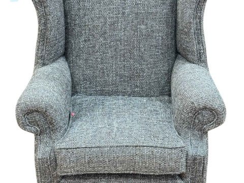 Childs wing armchair on silvered legs.