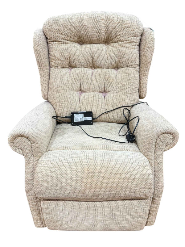Celebrity electric reclining chair in light fabric.