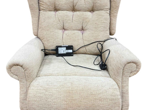 Celebrity electric reclining chair in light fabric.