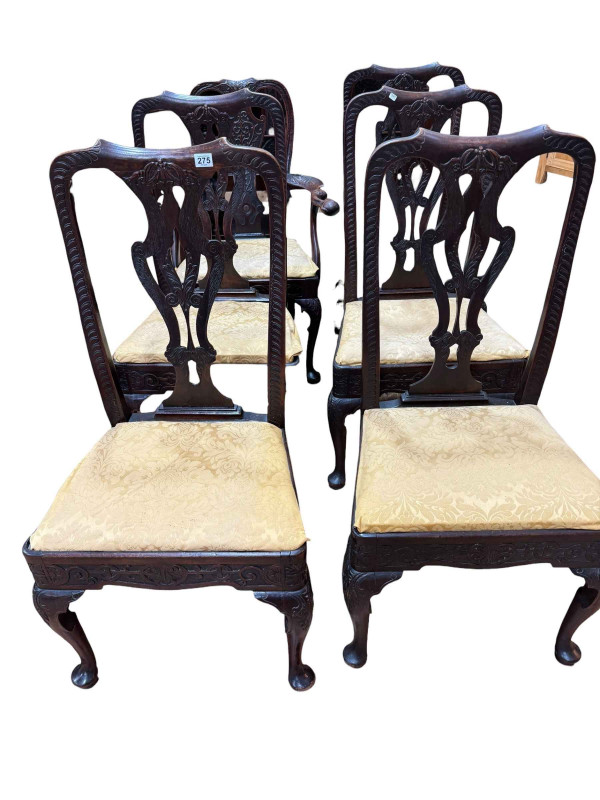 Set of five Georgian carved mahogany pad foot dining chairs together with a similar carver chair (6).