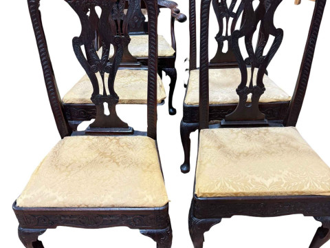 Set of five Georgian carved mahogany pad foot dining chairs together with...