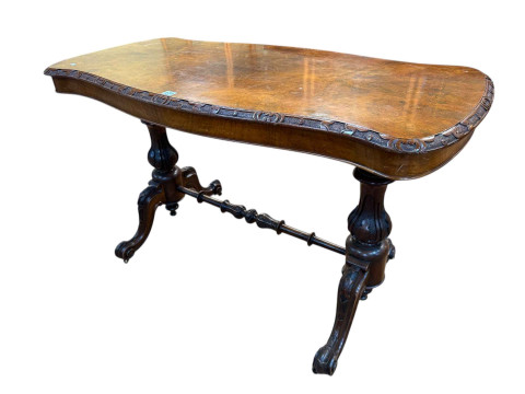 Victorian burr walnut side table, the serpentine shaped top on two carved...