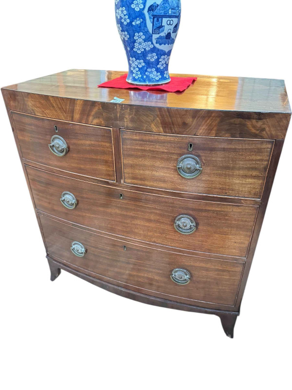 Victorian mahogany bow front chest of two short above two long drawers on splayed legs, 94.5cm by 91.5cm by 50cm.