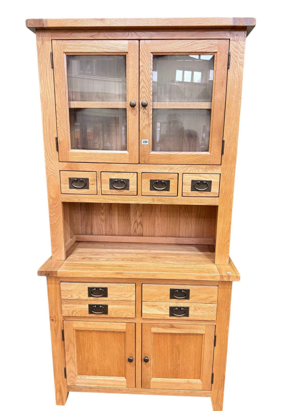 As new light oak glazed door top dresser, 200cm by 100cm by 45cm.