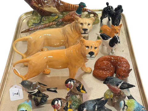 Two Beswick Lioness's, two Pheasants, three Dogs, Fox and seven Birds.