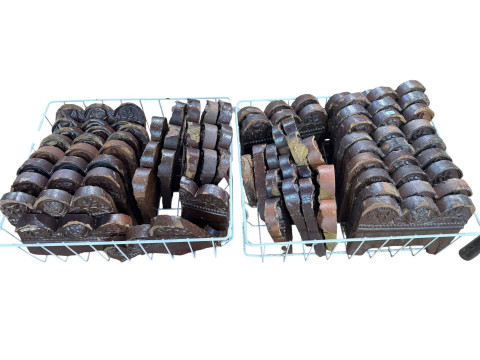 Collection of 19th Century salt glazed garden edging with thistle, rose...