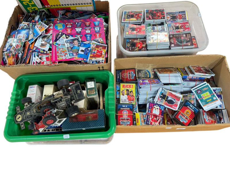 Four boxes of football trade cards, model vehicles, etc.