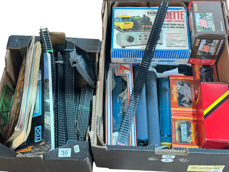 Two boxes of model railway including Duette Transformer, carriages and rolling stock, track etc.