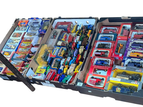 Three boxes of boxed and loose model vehicles including Corgi.