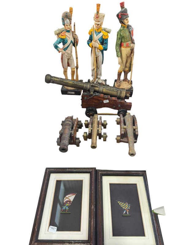 Three military figures on marble bases, four canon models and two Peter Watson standard bearer pictures.