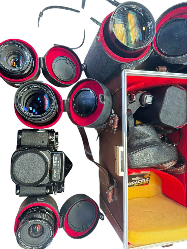 Asahi Pentax 6x7 camera and E S camera, several lenses including Super Multi Coated Takumar 6x7, SMC Pentax 6x7 45mm and 165mm lenses, further lenses and accessories.