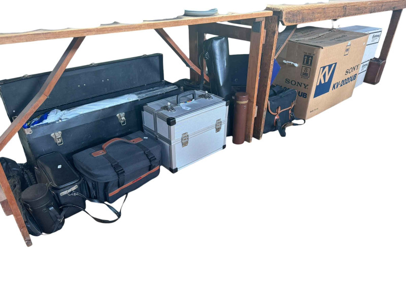 Large collection of photographic equipment including Yashica, Contax, Petri Flex and other cameras, lenses, tripods, flash guns etc.