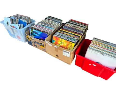 Four boxes of LP and single records.