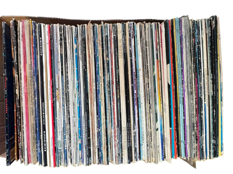 Four boxes of LP and single records.