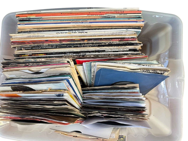 Four boxes of LP and single records.