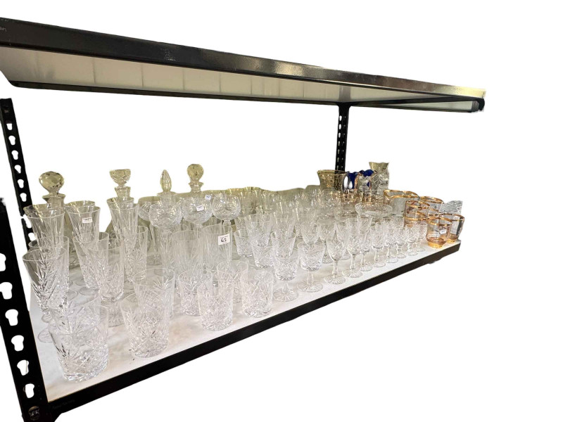 Large collection of glassware including decanters, lemonade sets, Royal Doulton figure The Master dog ornaments, various china etc.