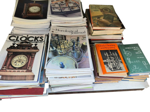 19th Century wall clock, Kienzle wall clock, large collection of Horological and clock books and magazines, slope front box desk etc. thumbnail