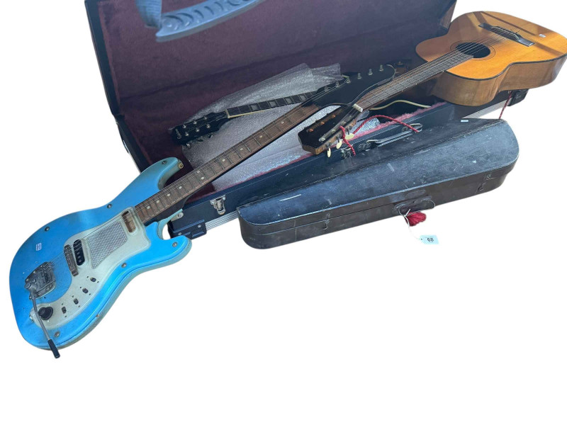 Two electric guitars, acoustic guitar, violin and two bows, banjo, ukelele and Torque TK50 amp.