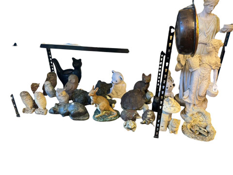 Two garden figures and collection of garden animals.