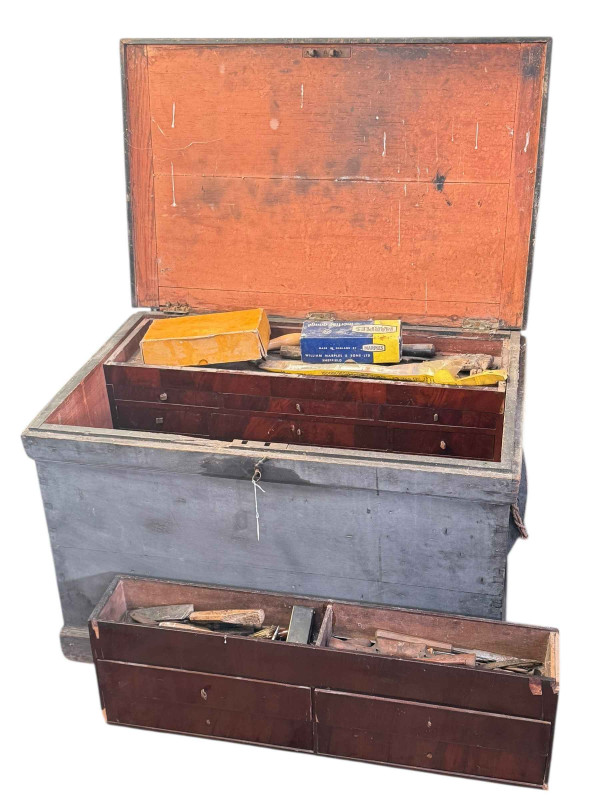 Large pine tool box with well fitted interior and collection of tools, including plates, saws, chisels.