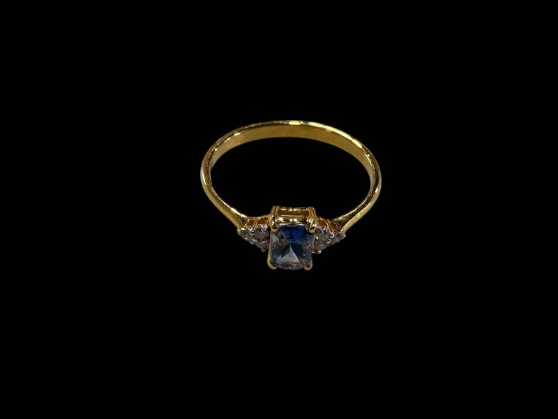 14 carat yellow gold Ceylon sapphire and diamond ring, size P.