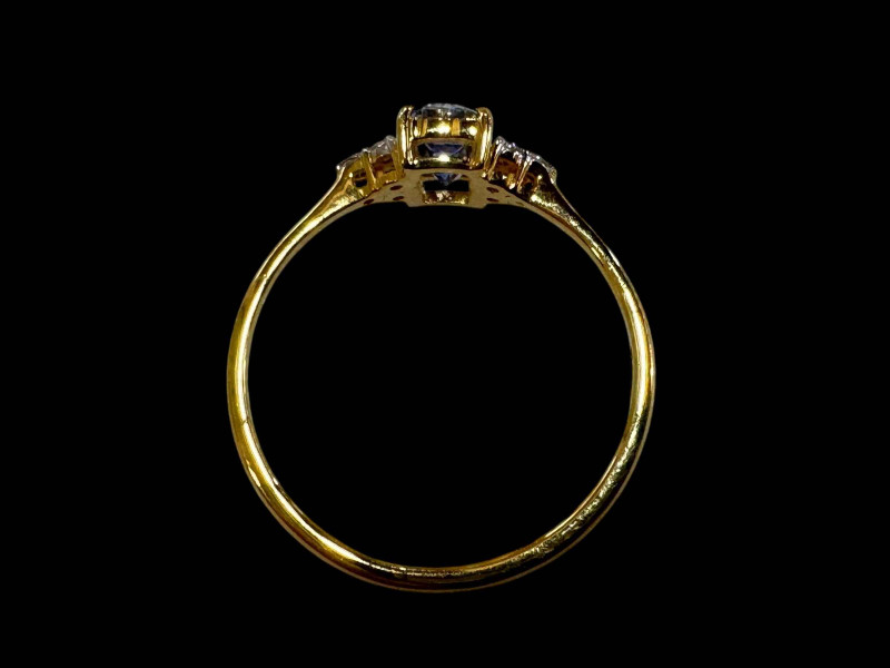 14 carat yellow gold Ceylon sapphire and diamond ring, size P.