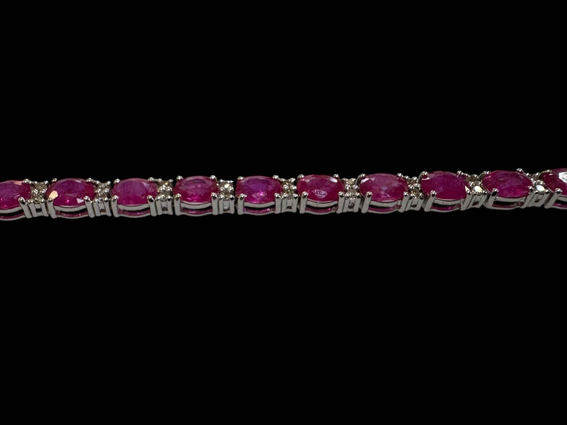 Ruby and diamond bracelet set in 18 carat white gold, rubies 9.40cts and diamonds 0.48cts.