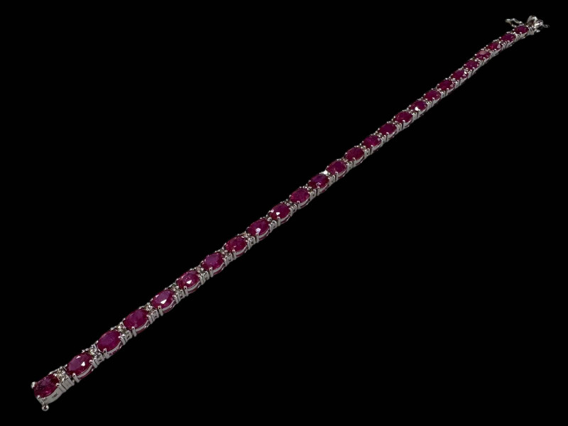 Ruby and diamond bracelet set in 18 carat white gold, rubies 9.40cts and diamonds 0.48cts.