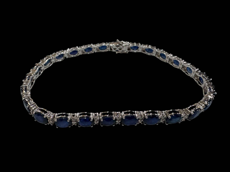 Sapphire and diamond bracelet set in 18 carat white gold, sapphire 9.50cts and diamonds 0.28cts.