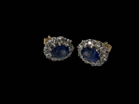 Good pair of sapphire and diamond cluster 18 carat gold earrings, boxed.