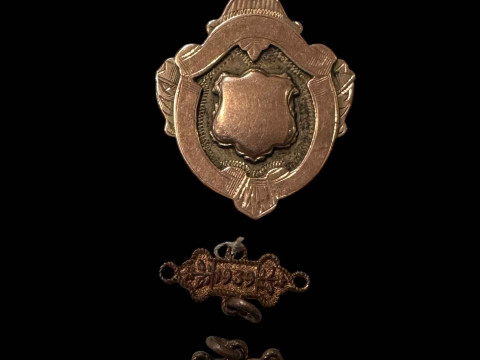 9 carat gold South Banks FC medal.