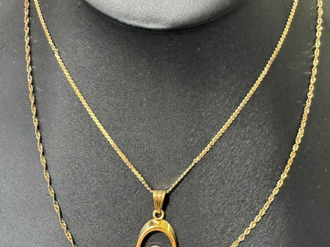 Two 9 carat gold chain necklaces (one with pendant)