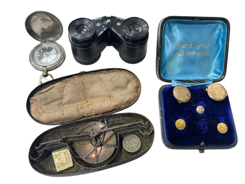 Two 18 carat gold collar studs, scales, compass and opera glasses.