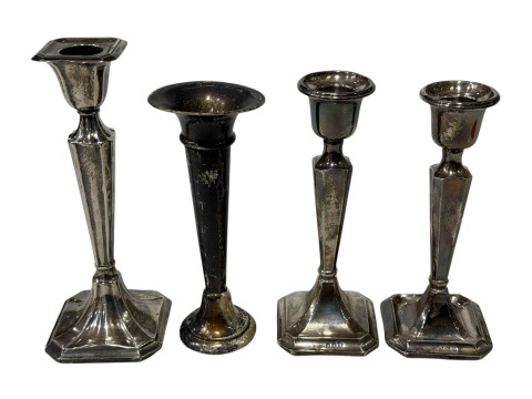 Three loaded silver candlesticks and spill vase (4).