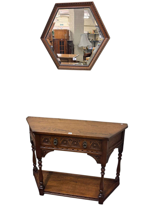 Old Charm canted corner single drawer console table 77 x 107 x 32.5cm together with a similar hexagonal oak framed bevelled wall mirror.