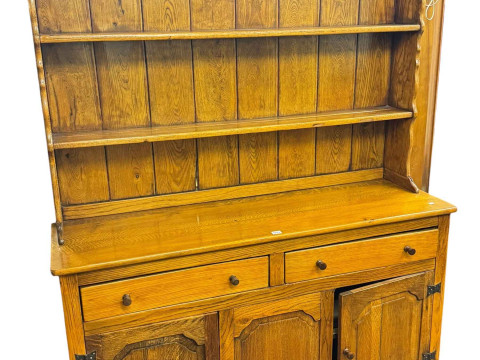 Oak six-drawer kneehole desk and oak three-door shelf back dresser (2).