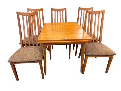 Teak draw leaf dining table and set of five rail back dining chairs, table...