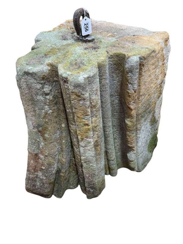 Large weathered sandstone fluted stand.