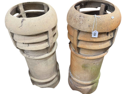 Pair vintage aerated top chimney pots.