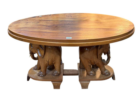 Oval twin elephant pedestal coffee table, 51 x 93 x 62cm.