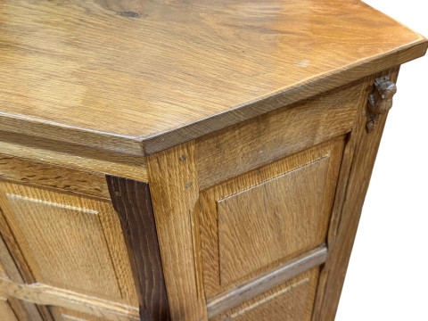 Colin 'Beaverman' Almack floor standing panelled oak single door corner cabinet, 69cm. thumbnail
