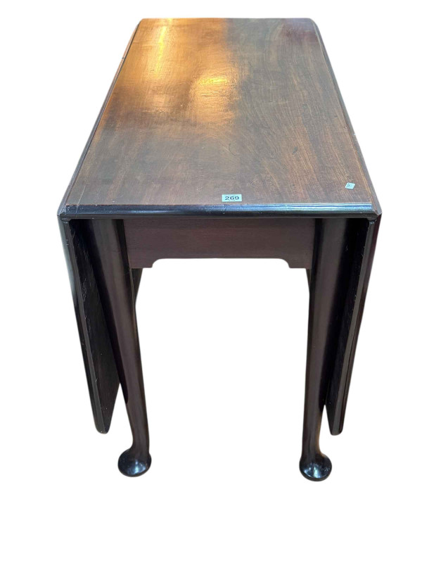 Georgian mahogany drop leaf pad foot dining table.