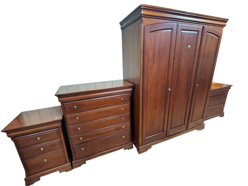 Olympus Furniture Ltd cherrywood finish four piece bedroom suite comprising triple door wardrobe, six and four-drawer chests and four-drawer pedestal chest.