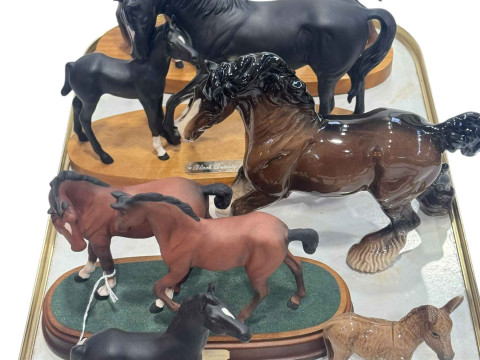 Collection of Beswick and Royal Doulton horses including Black Beauty...