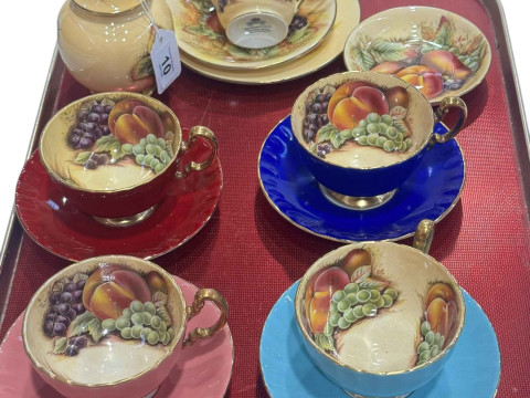 Four Aynsley cabinet cups and saucers with fruit decoration and five pieces...