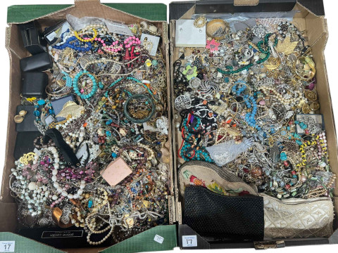 Two boxes of costume jewellery, ladies evening bags, etc.