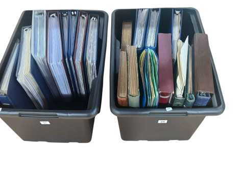 Nineteen organised stamp albums.