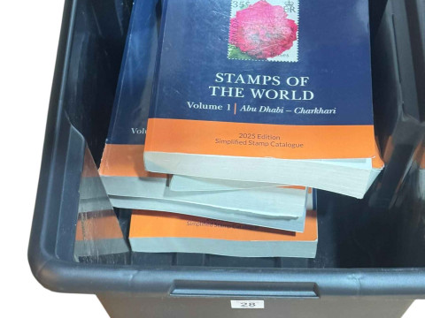 Six volumes of Stanley Gibbons 2025 stamp catalogues.