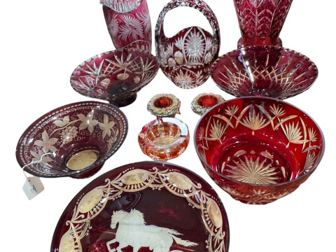 Collection of ruby decorated glassware including vases, bowls and horse...